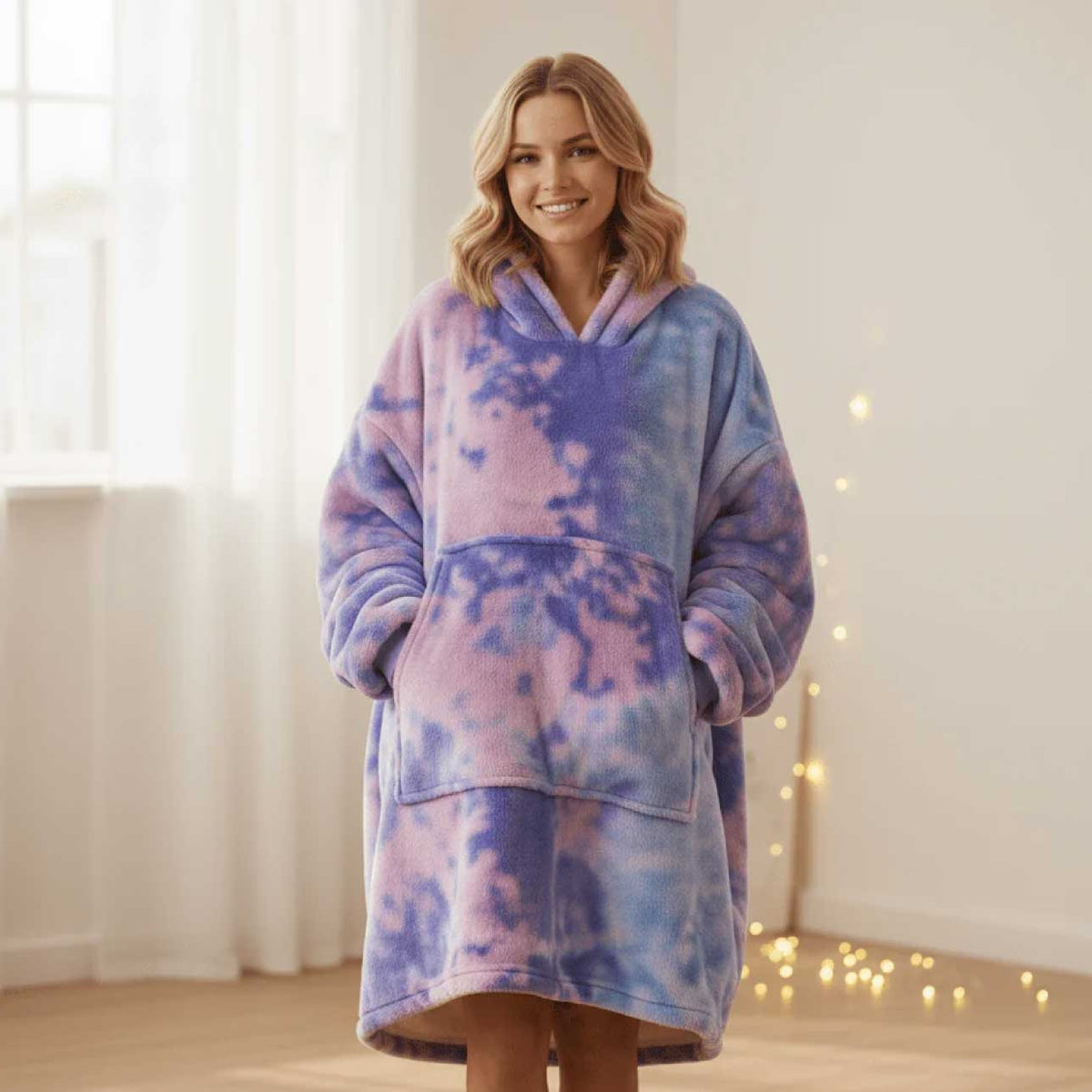 The Manam Cocoon wearable blanket in Pink & Purple